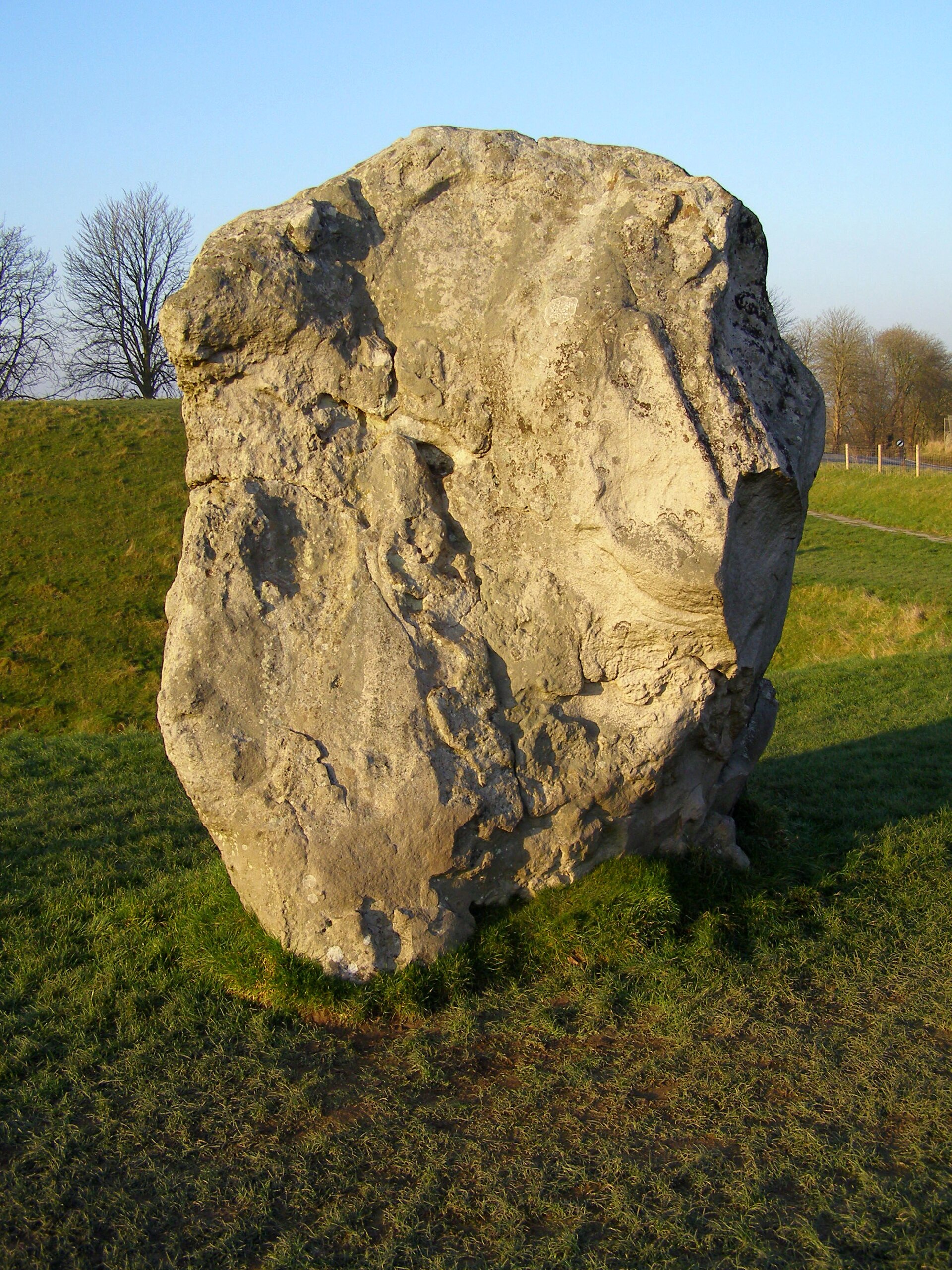 Close view of the broad weathered face of Stone 44 in Avebury’s Great Circle